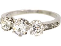 Early 20th Century Platinum, Three Stone Diamond Ring with Diamond set Shoulders
