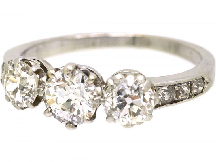 Early 20th Century Platinum, Three Stone Diamond Ring with Diamond set Shoulders