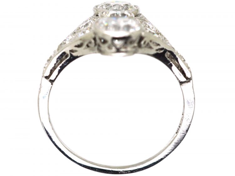 Art Deco Platinum Ring set with Three Diamonds with Smaller Diamonds on Either Side