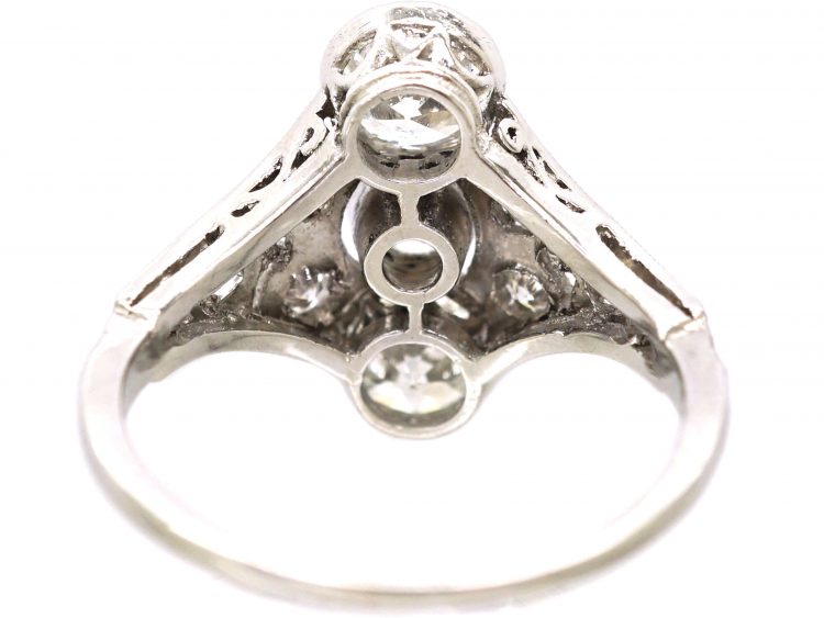 Art Deco Platinum Ring set with Three Diamonds with Smaller Diamonds on Either Side