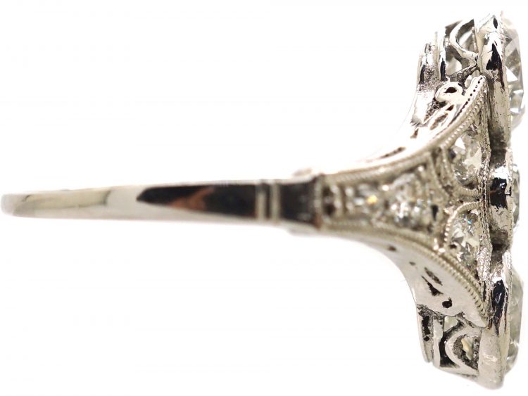 Art Deco Platinum Ring set with Three Diamonds with Smaller Diamonds on Either Side