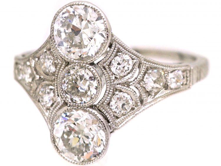 Art Deco Platinum Ring set with Three Diamonds with Smaller Diamonds on Either Side