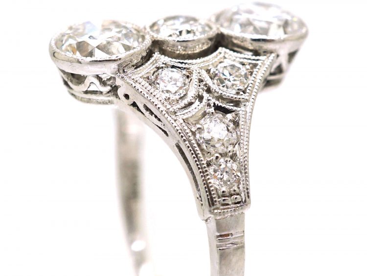 Art Deco Platinum Ring set with Three Diamonds with Smaller Diamonds on Either Side