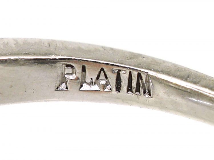 Art Deco Platinum Ring set with Three Diamonds with Smaller Diamonds on Either Side