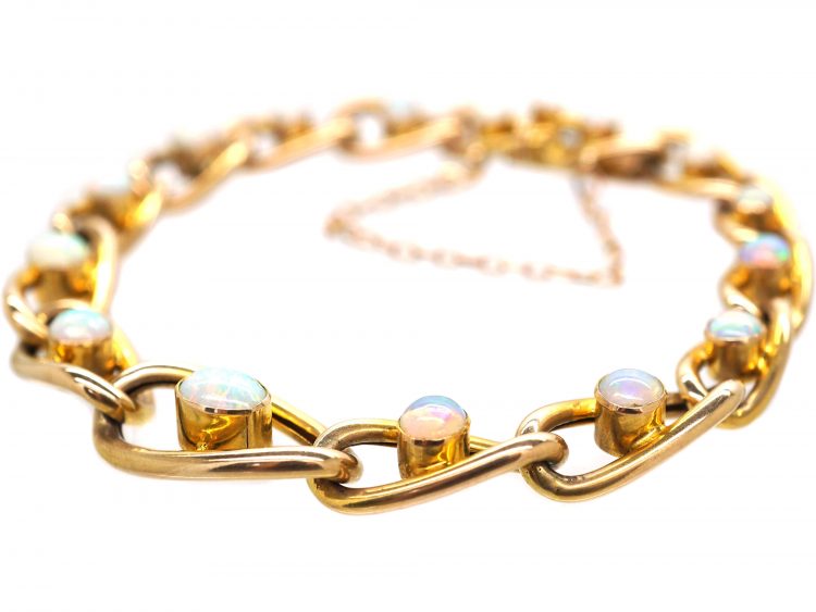 Edwardian 9ct Gold Curb Bracelet set with Opals