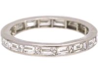 French Early 20th Century Platinum Eternity Ring set with Baguette Cut Diamonds