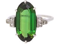 Art Deco Platinum Ring set with an Oval Green Tourmaline with Diamond Set Shoulders
