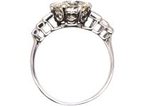 Art Deco Platinum, Diamond Solitaire Ring with Step Cut Shoulders set with Baguette Diamonds