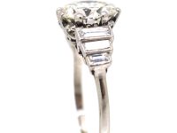Art Deco Platinum, Diamond Solitaire Ring with Step Cut Shoulders set with Baguette Diamonds