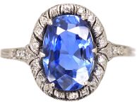 Art Deco Platinum Ring set with an Oval Sapphire & Small Diamonds