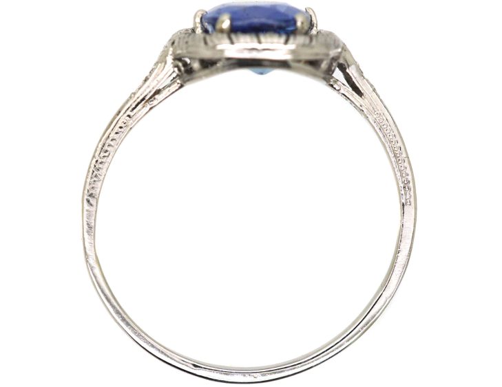 Art Deco Platinum Ring set with an Oval Sapphire & Small Diamonds