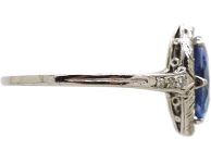 Art Deco Platinum Ring set with an Oval Sapphire & Small Diamonds