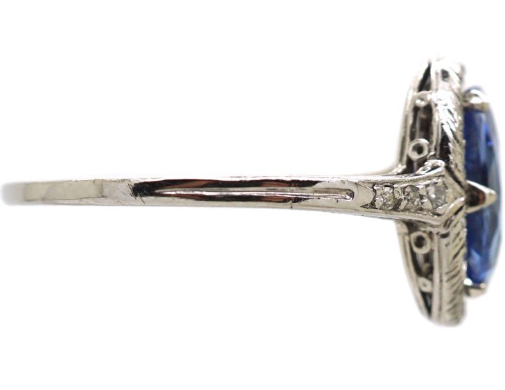 Art Deco Platinum Ring set with an Oval Sapphire & Small Diamonds