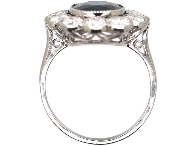 Early 20th Century Platinum, Large Sapphire & Diamond Oval Cluster Ring