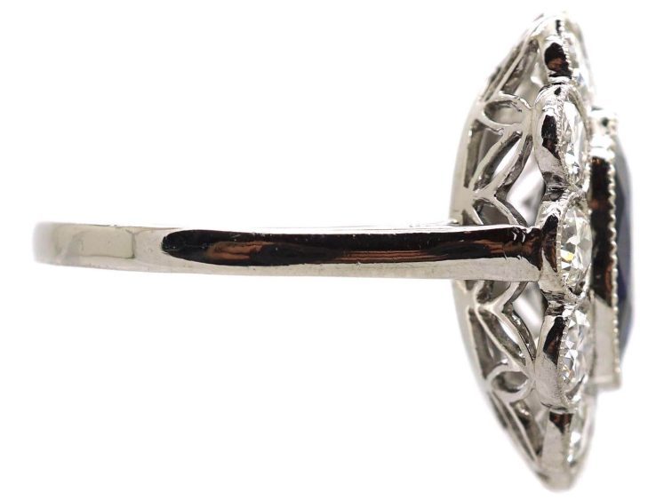 Early 20th Century Platinum, Large Sapphire & Diamond Oval Cluster Ring