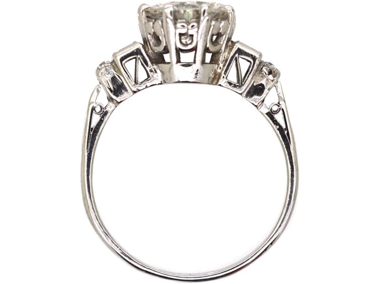 Art Deco Platinum Diamond Solitaire Ring with Baguette Cut Diamond Step Cut Shoulders