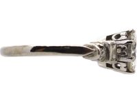 Art Deco Platinum Diamond Solitaire Ring with Baguette Cut Diamond Step Cut Shoulders