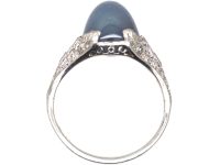 Art Deco Platinum Ring set with a Cabochon Sapphire & Diamonds