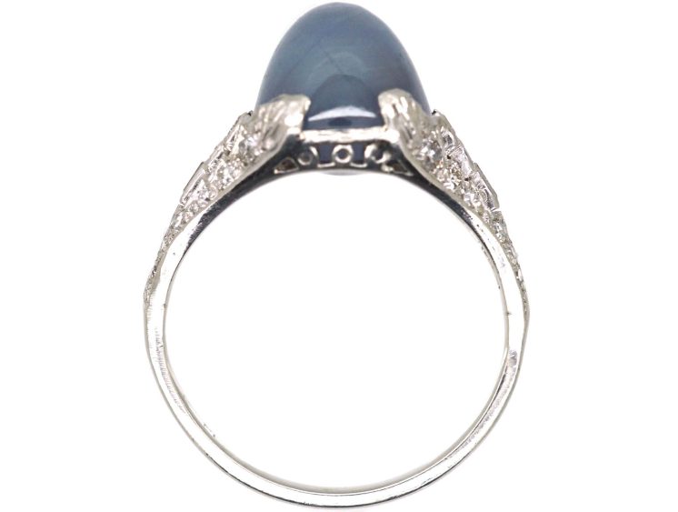 Art Deco Platinum Ring set with a Cabochon Sapphire & Diamonds
