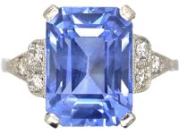 Art Deco Platinum Rectangular Cut Sapphire Ring with Step Cut Diamond Shoulders