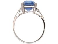 Art Deco Platinum Rectangular Cut Sapphire Ring with Step Cut Diamond Shoulders