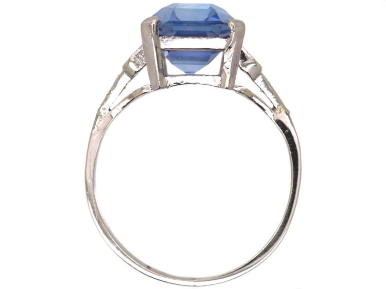 Art Deco Platinum Rectangular Cut Sapphire Ring with Step Cut Diamond Shoulders