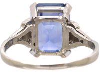 Art Deco Platinum Rectangular Cut Sapphire Ring with Step Cut Diamond Shoulders