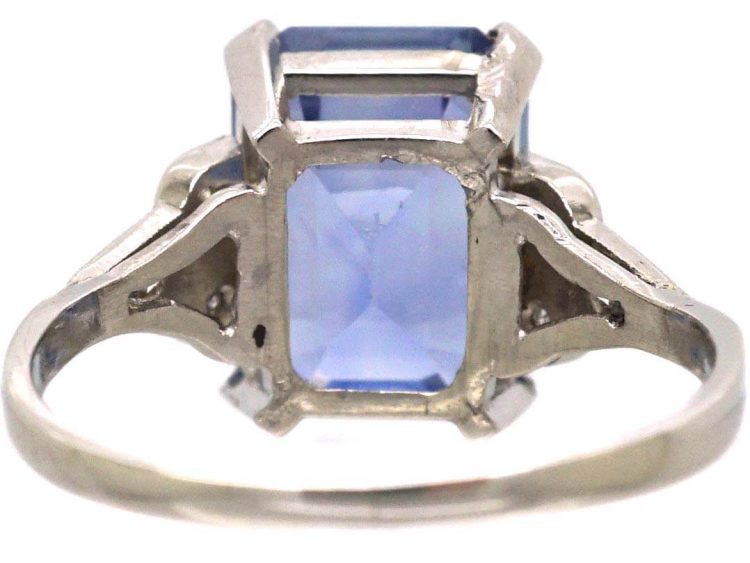 Art Deco Platinum Rectangular Cut Sapphire Ring with Step Cut Diamond Shoulders