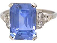 Art Deco Platinum Rectangular Cut Sapphire Ring with Step Cut Diamond Shoulders