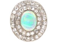 Early 20th Century Large Platinum Cluster Ring set with an Opal & Diamonds
