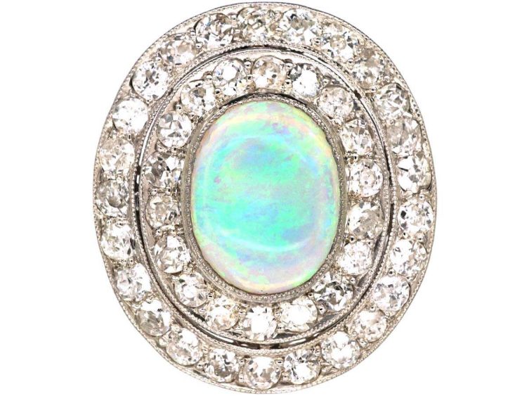 Early 20th Century Large Platinum Cluster Ring set with an Opal & Diamonds