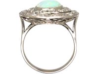 Early 20th Century Large Platinum Cluster Ring set with an Opal & Diamonds