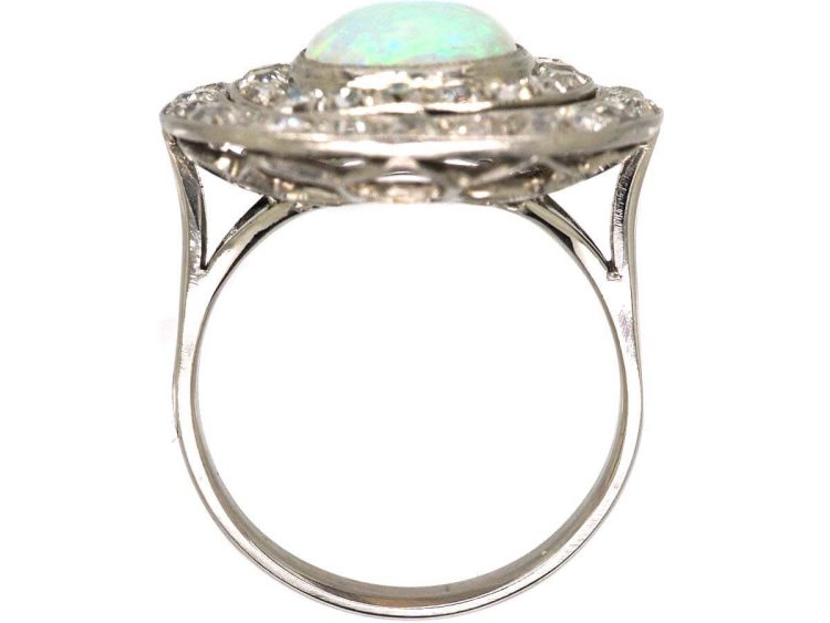 Early 20th Century Large Platinum Cluster Ring set with an Opal & Diamonds