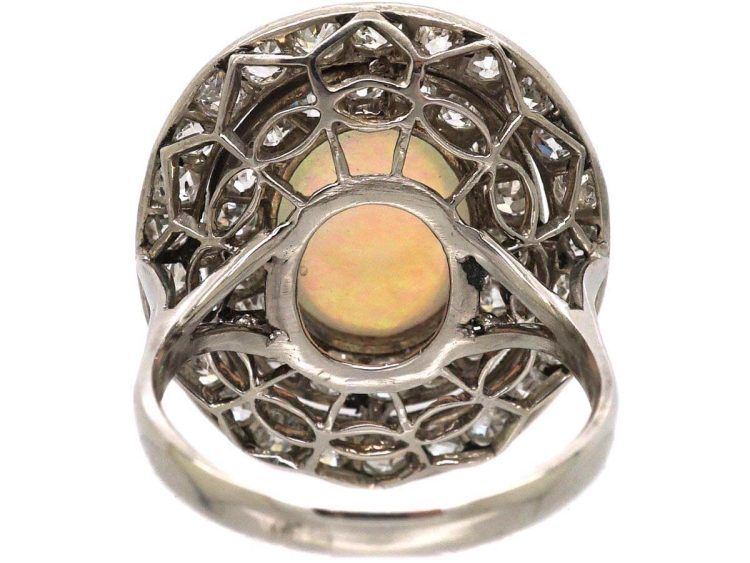 Early 20th Century Large Platinum Cluster Ring set with an Opal & Diamonds