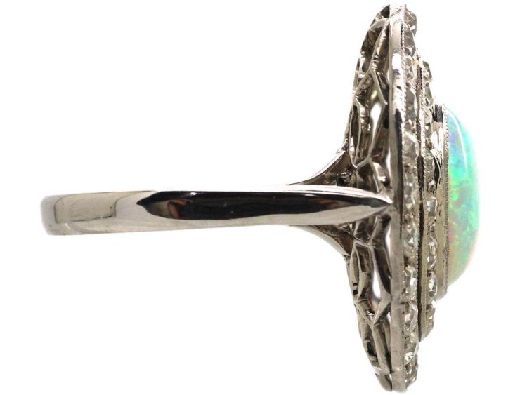 Early 20th Century Large Platinum Cluster Ring set with an Opal & Diamonds