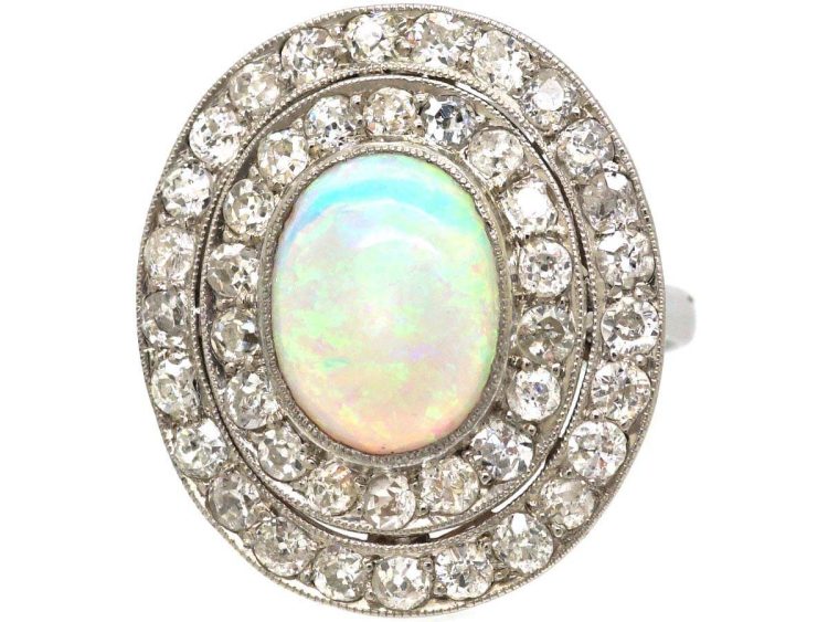 Early 20th Century Large Platinum Cluster Ring set with an Opal & Diamonds