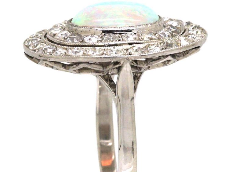 Early 20th Century Large Platinum Cluster Ring set with an Opal & Diamonds