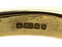 Modernist 18ct Gold Ring set with a Cabochon Cut Green Tourmaline