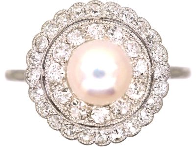 Early 20th Century Platinum Cluster Ring set with a Bouton Pearl & Diamonds