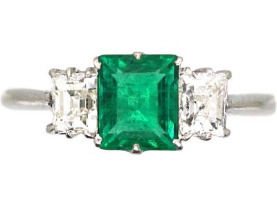 Art Deco Platinum Three Stone Ring set with a Rectangular cut Emerald & Diamonds